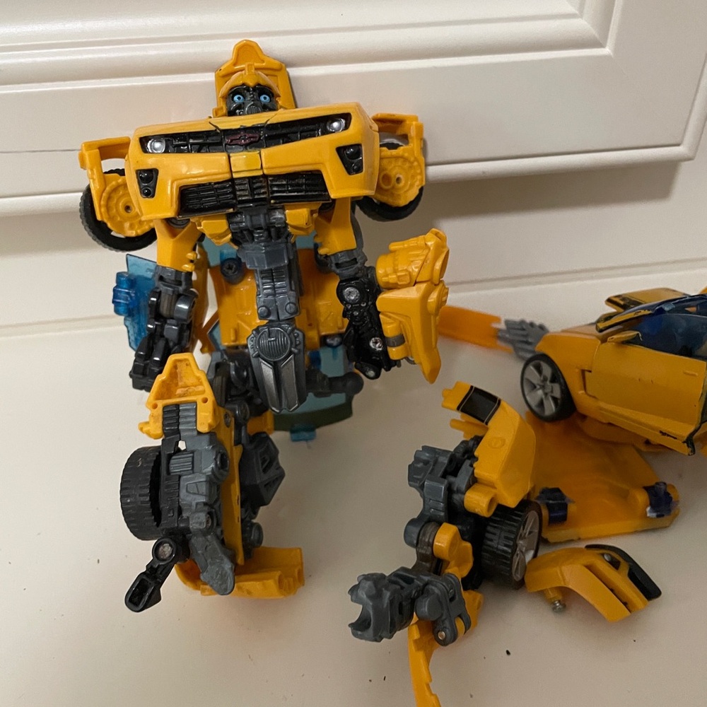 Yellow Robot Transforming Action Toy - Kids Toys parts are missing